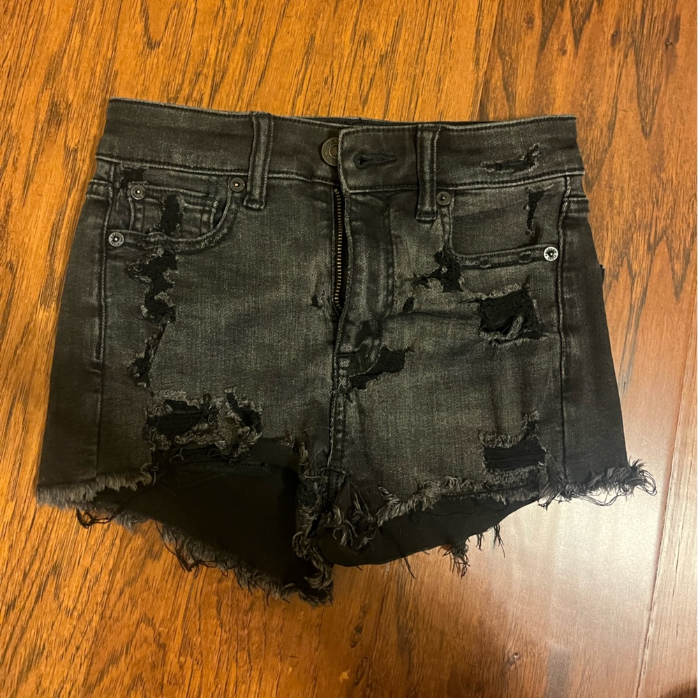 black ripped jean shorts